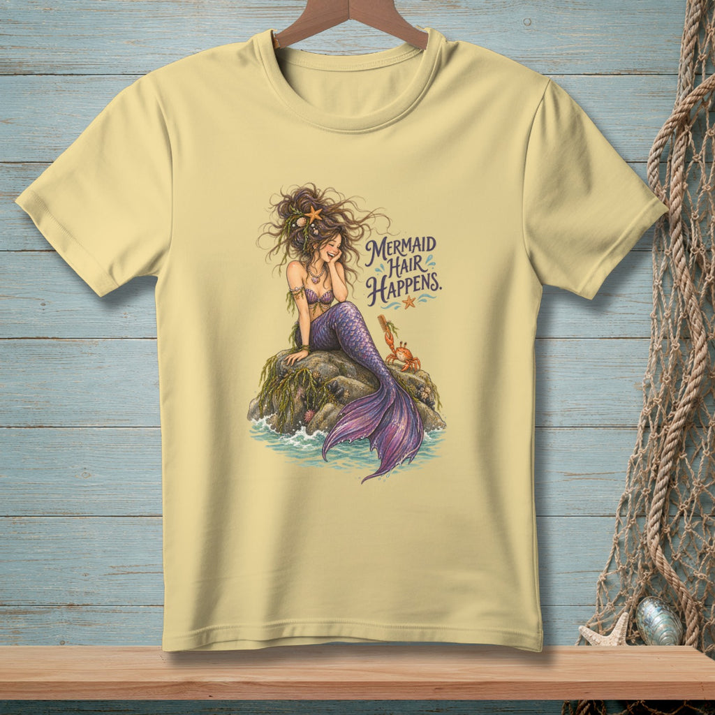 Light yellow t-shirt with a mermaid and crab graphic and text "Mermaid Hair Happens."