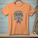 Peach t-shirt with mermaid tail and text "KEEP YOUR DRAMA ABOVE SEA LEVEL".