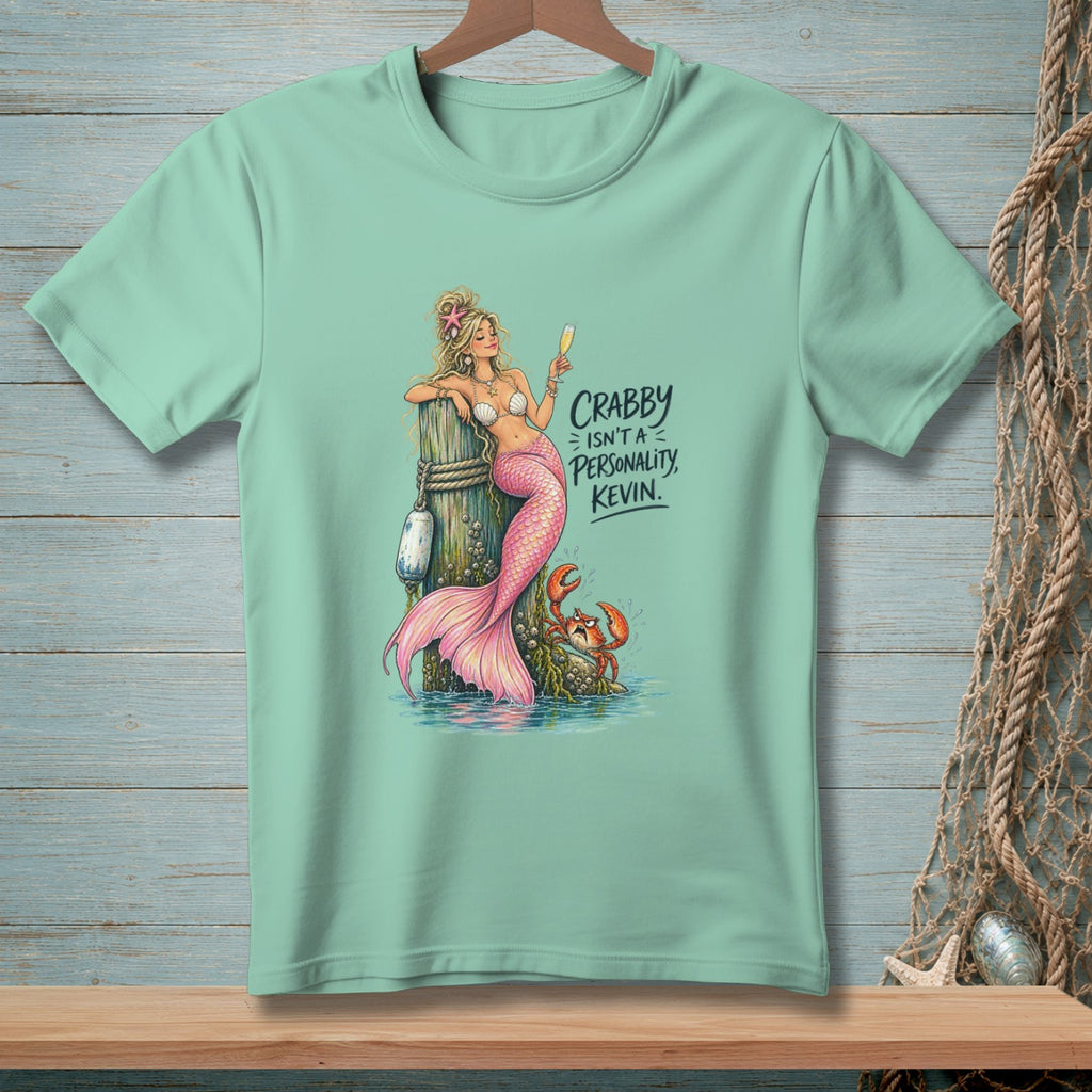 Mint green t-shirt with mermaid, crab, and text "Crabby Isn't A Personality, Kevin."