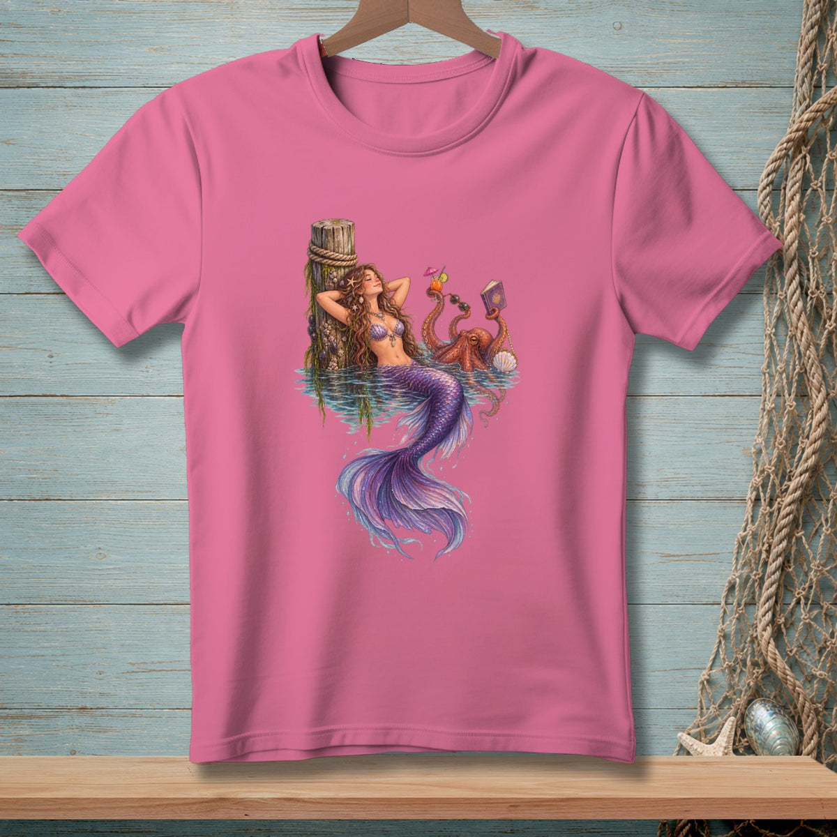 Mermaid lounging by a dock with an octopus holding drinks and a book.