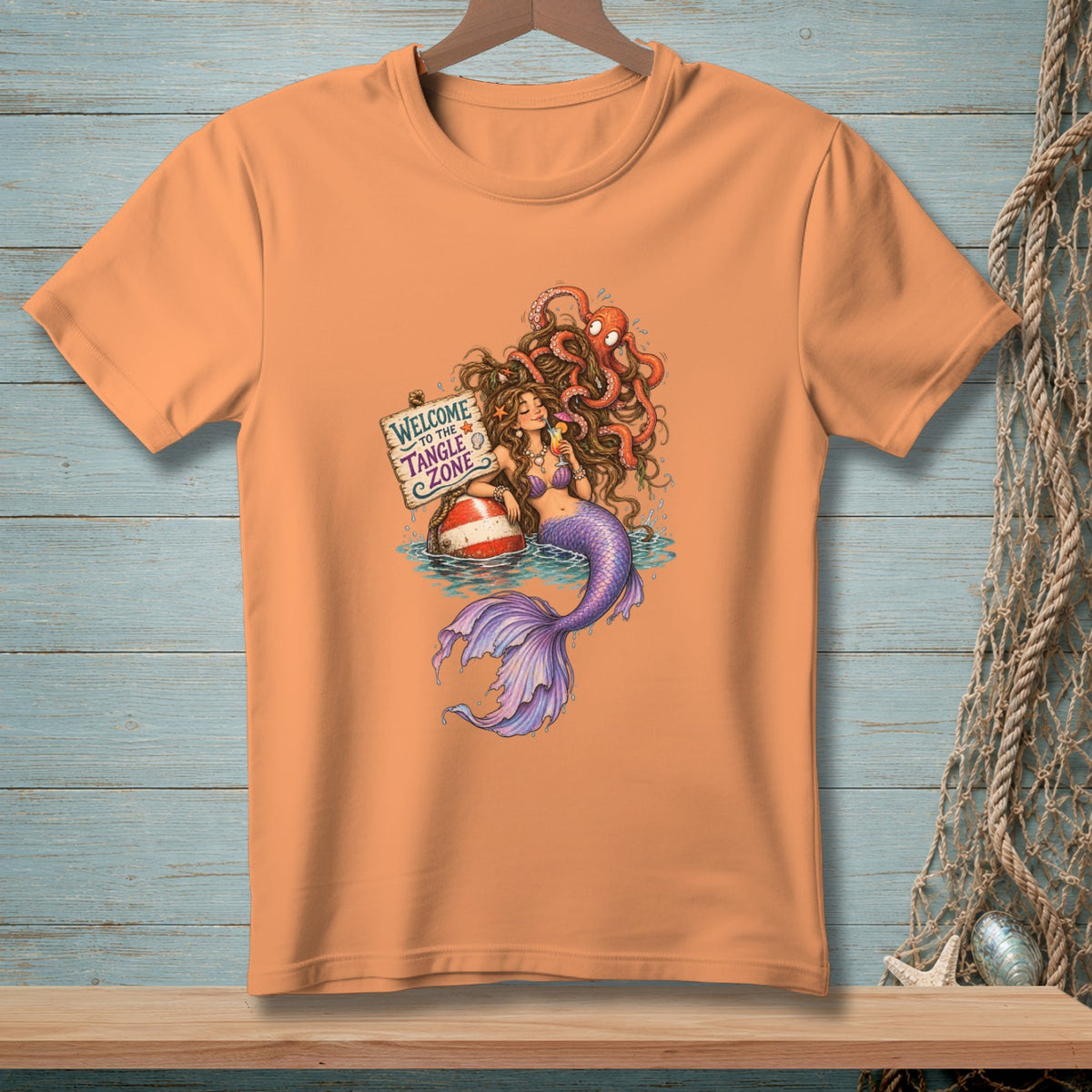 Mermaid with octopus in hair holds drink and sits on buoy, "Welcome to the Tangle Zone" sign.