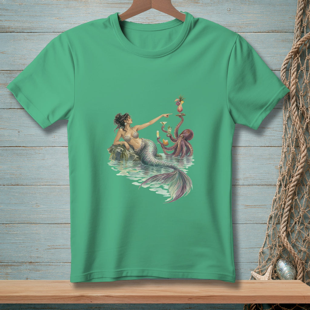 Mermaid and octopus enjoying cocktails by the water on a green t-shirt.