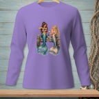 Two mermaids sit on a dock, one pouring wine for the other.