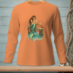 Orange long-sleeve shirt with a mermaid sitting on a dock, reading a letter.