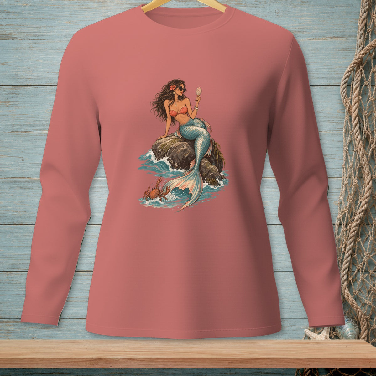 Mermaid with seashell mirror sits on rock with crab in splashing water.