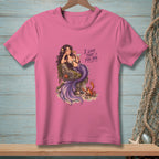 Pink t-shirt featuring a mermaid with purple tail on a rock, and text "I LOVE THAT FOR YOU."