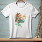 White t-shirt featuring a mermaid with a cocktail and a pufferfish.