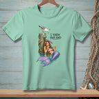 Mint green t-shirt with mermaid, seagull, and text "I KNOW YOUR KIND."