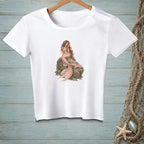 White t-shirt with a mermaid sitting on a rock, detailed illustration.