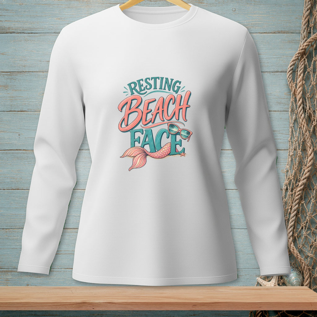 White long-sleeved shirt with "Resting Beach Face" graphic and mermaid tail.