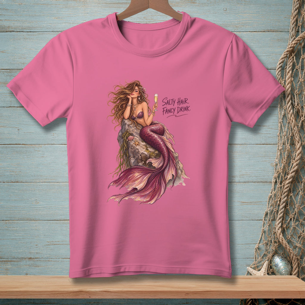 Pink t-shirt with a mermaid graphic and text "Salty Hair. Fancy Drink."