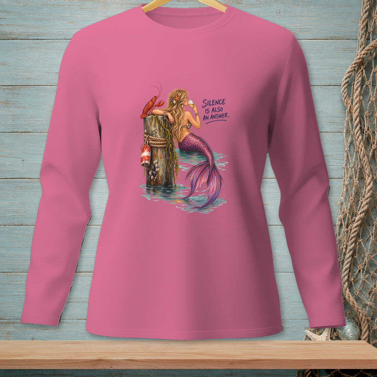 Pink long-sleeve shirt featuring a mermaid with a lobster and text "Silence Is Also An Answer."