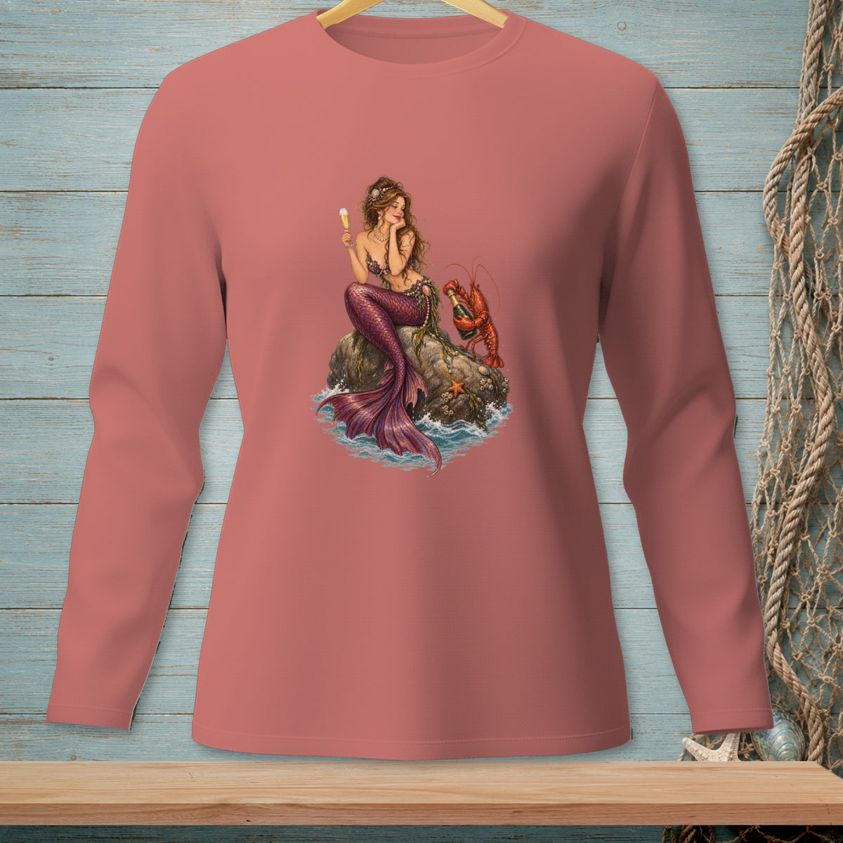 Mermaid with a lobster, sitting on a rock holding ice cream.