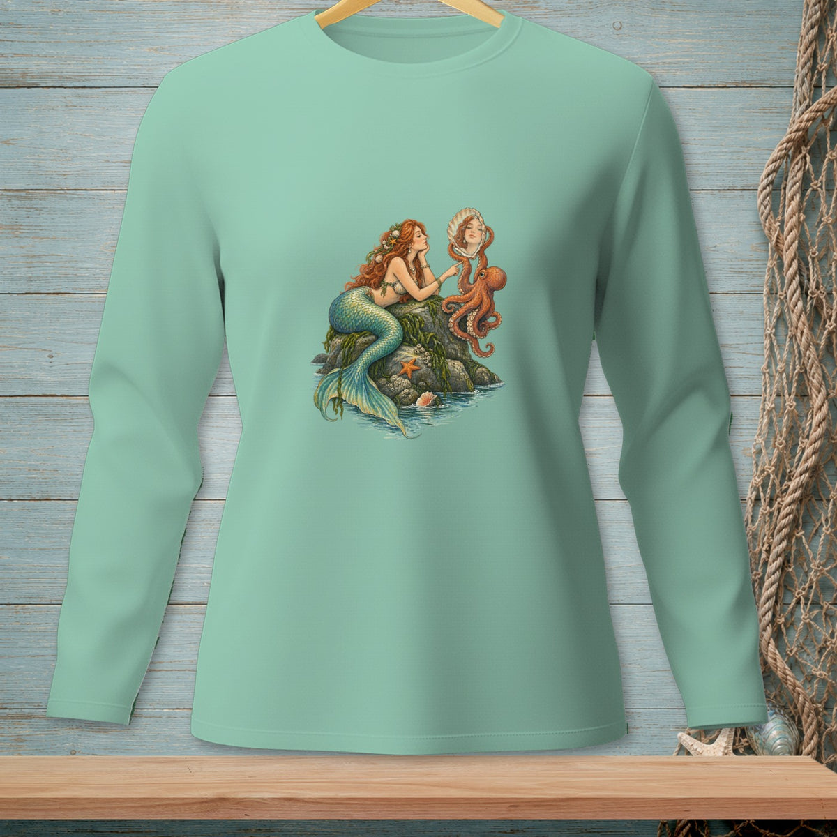 Mermaid with octopus and seashell mirror on a rock.