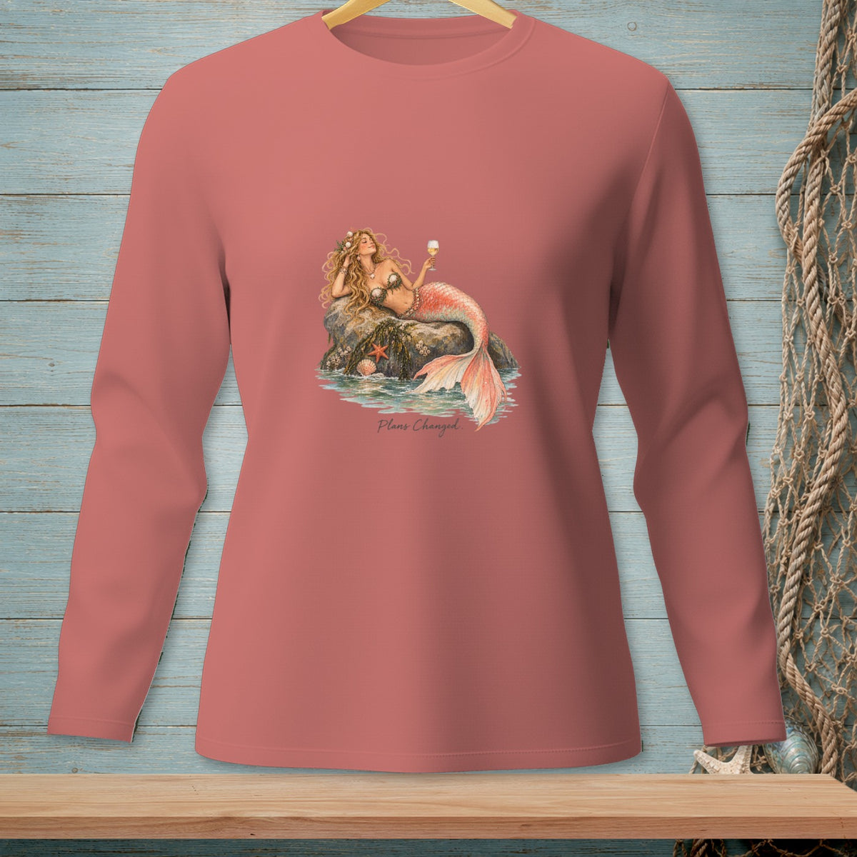 Mermaid with a drink on a rock, "Plans Changed." text on shirt.