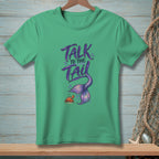 Green t-shirt with purple text "TALK TO THE TAIL", mermaid tail, and crab graphic.