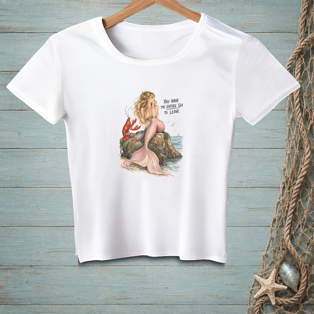 White t-shirt with a mermaid, lobster, and text "YOU HAVE THE ENTIRE SEA TO LEAVE."
