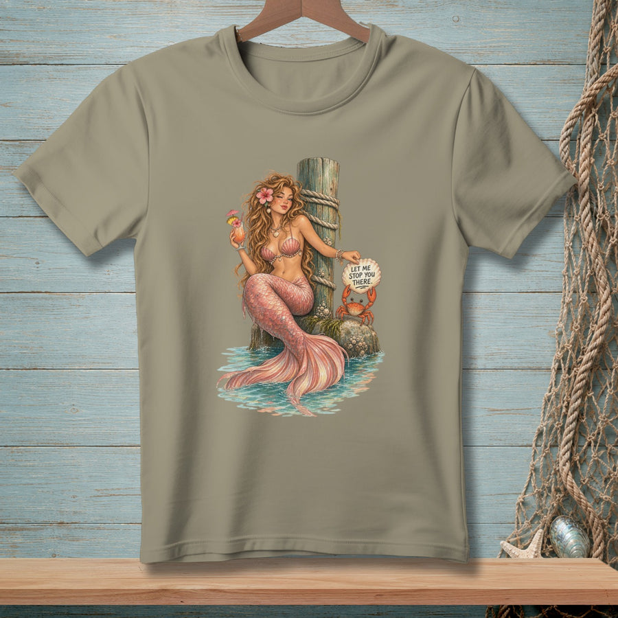 T-shirt with mermaid sitting by a post holding a drink, near a crab with a sign.