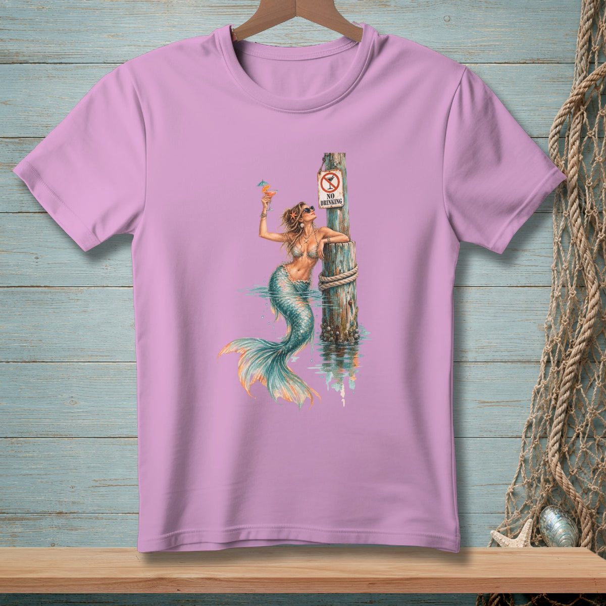 Mermaid with cocktail holding onto a post with "No Drinking" sign.