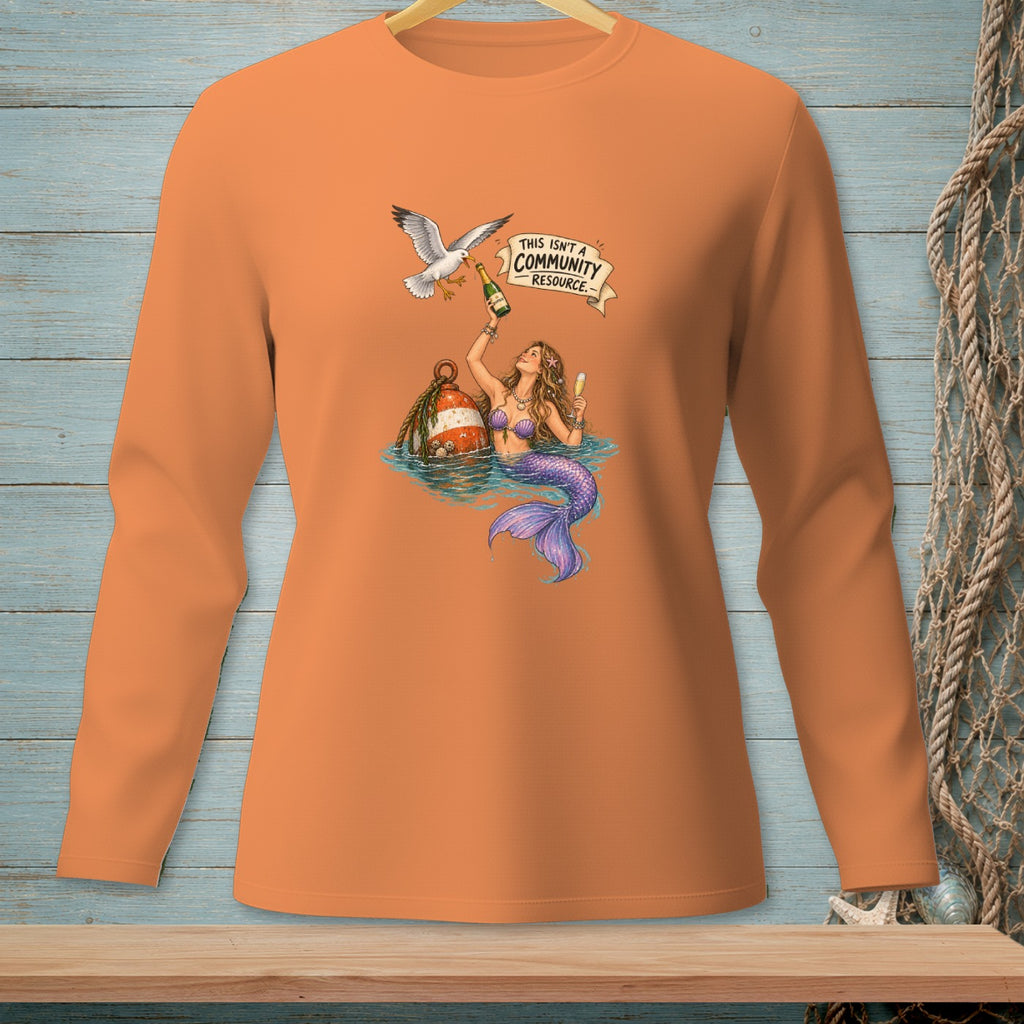 Mermaid with champagne and a seagull on an orange long-sleeve shirt.