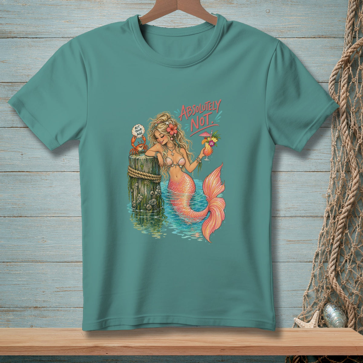 T-shirt with mermaid, crab, and "Absolutely Not" text in coral.