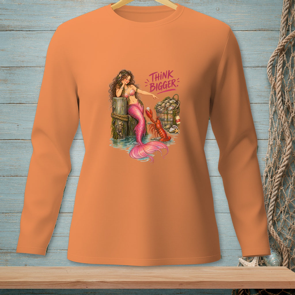 Orange long-sleeve shirt with a mermaid, lobster, and oysters graphic that says "Think Bigger."