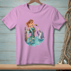 Mermaid pours champagne for a dolphin on a dock with ocean waves.