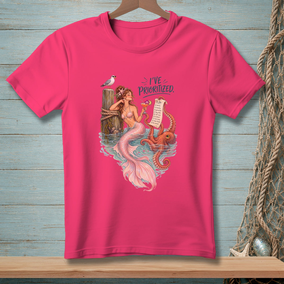 Mermaid with octopus on a pier, holding a drink and a prioritized to-do list.