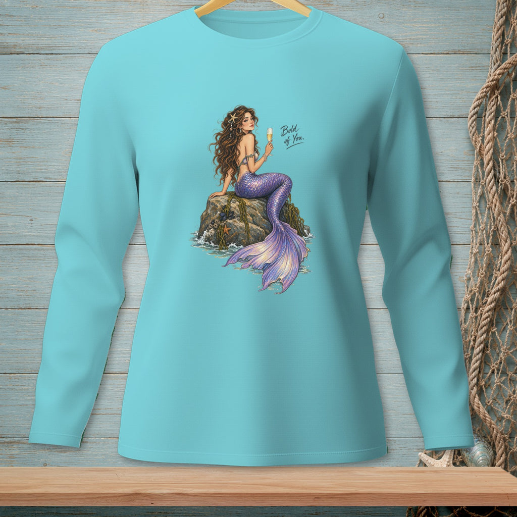 Mermaid on a rock holding a champagne glass, text reads "Bold of You."