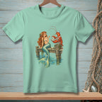 Mermaid on pier with lobster holding a pearl in an oyster shell.