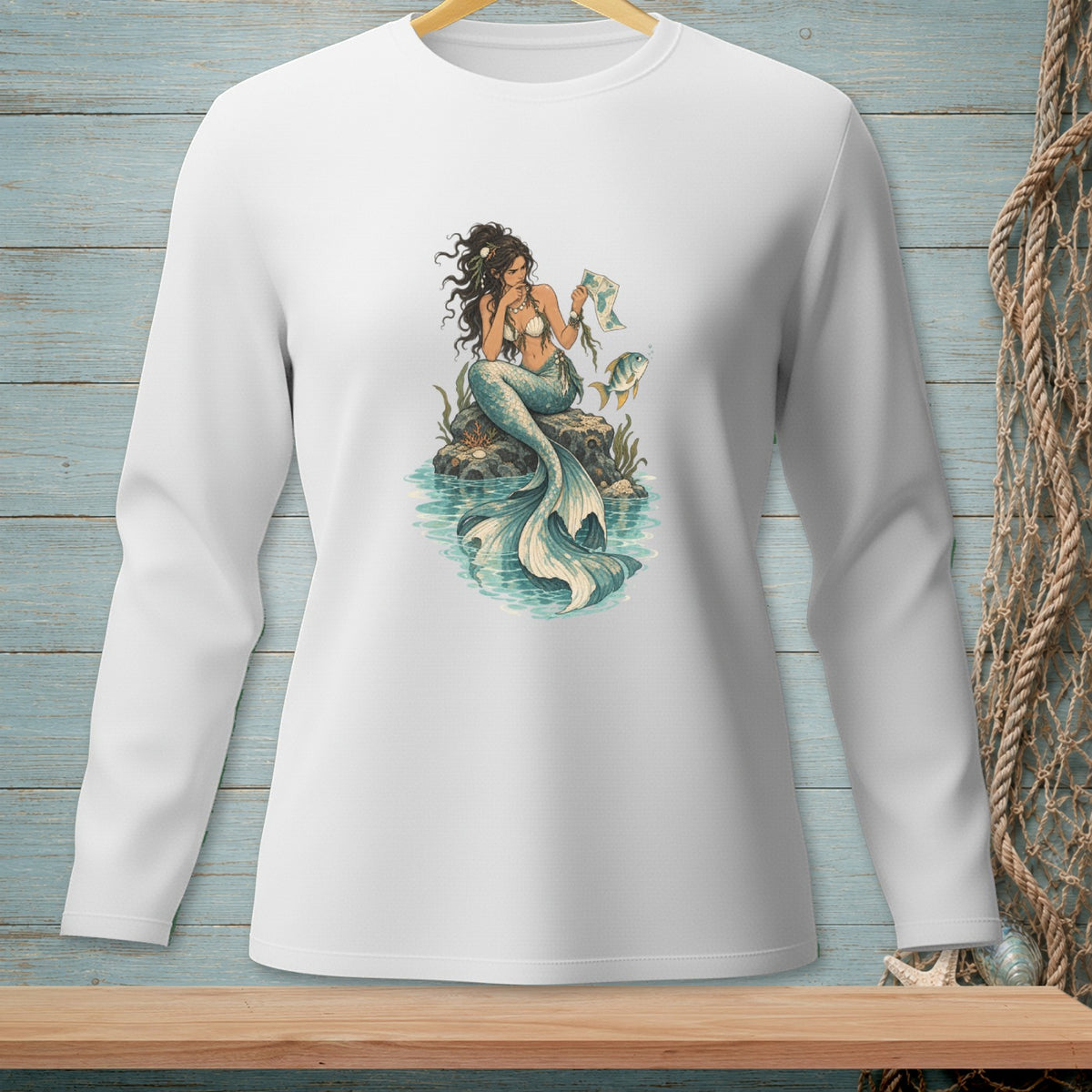Illustration of a mermaid sitting on a rock with a fish and a map.