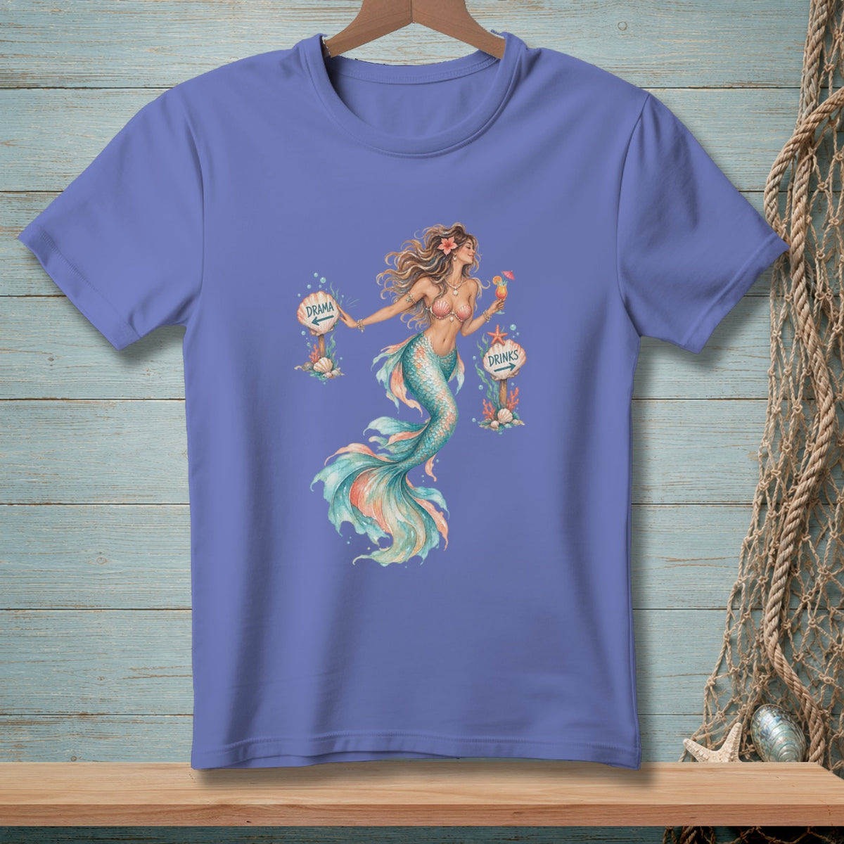 T-shirt with a watercolor mermaid holding a drink, next to signs for "Drama" and "Drinks".