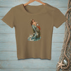Brown t-shirt featuring a mermaid and lobster illustration with water and waves.