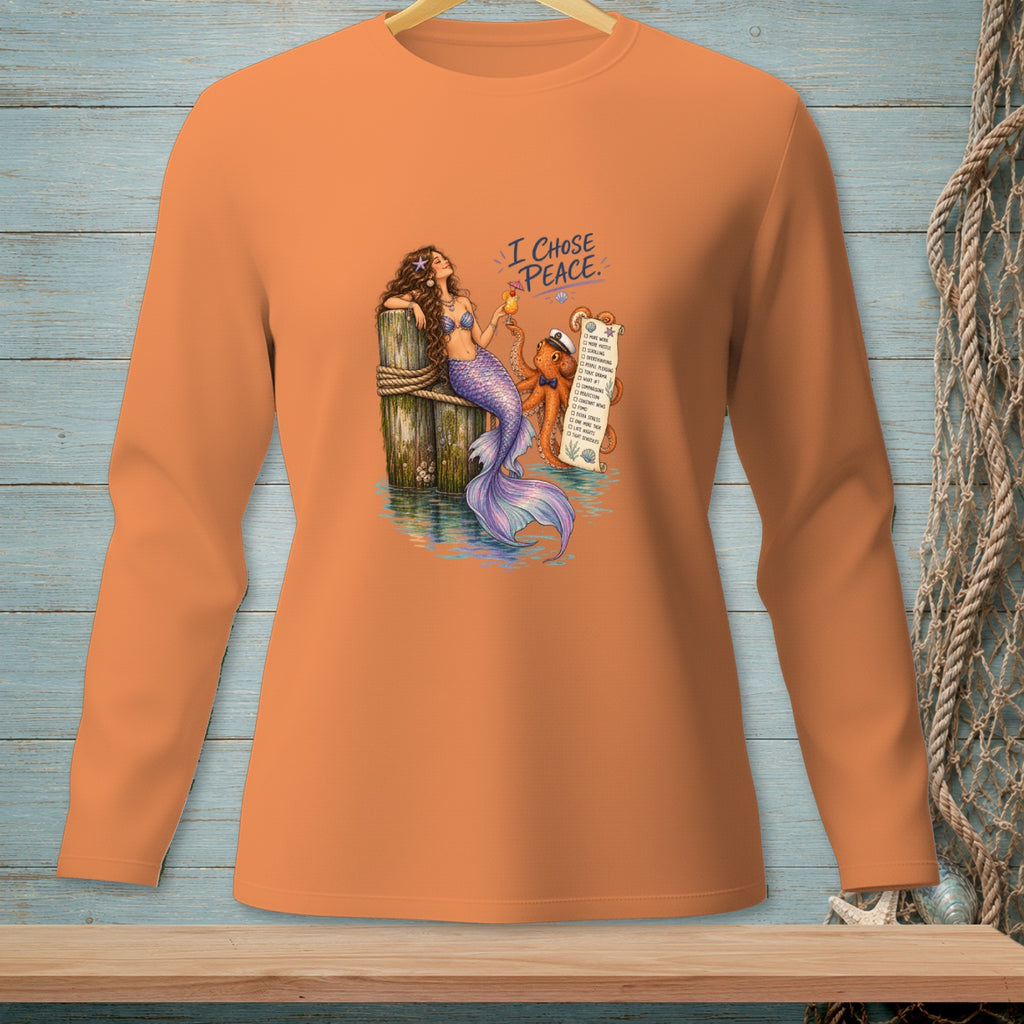 Mermaid and octopus next to "I CHOSE PEACE" list on orange shirt.