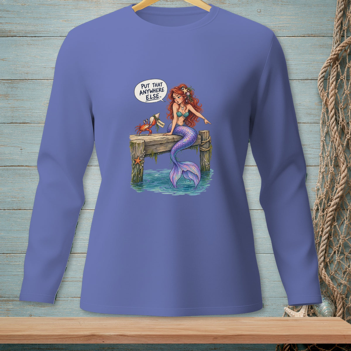 Mermaid with crab on dock, saying "Put that anywhere else."
