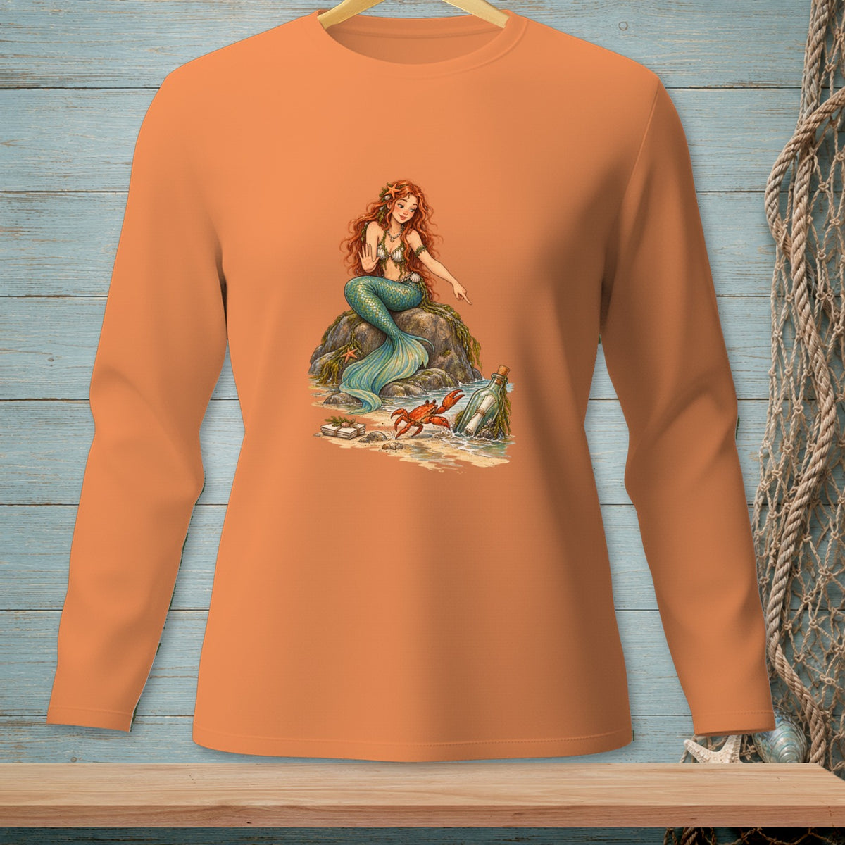 Illustration of a mermaid sitting on a rock with a crab and a message in a bottle.