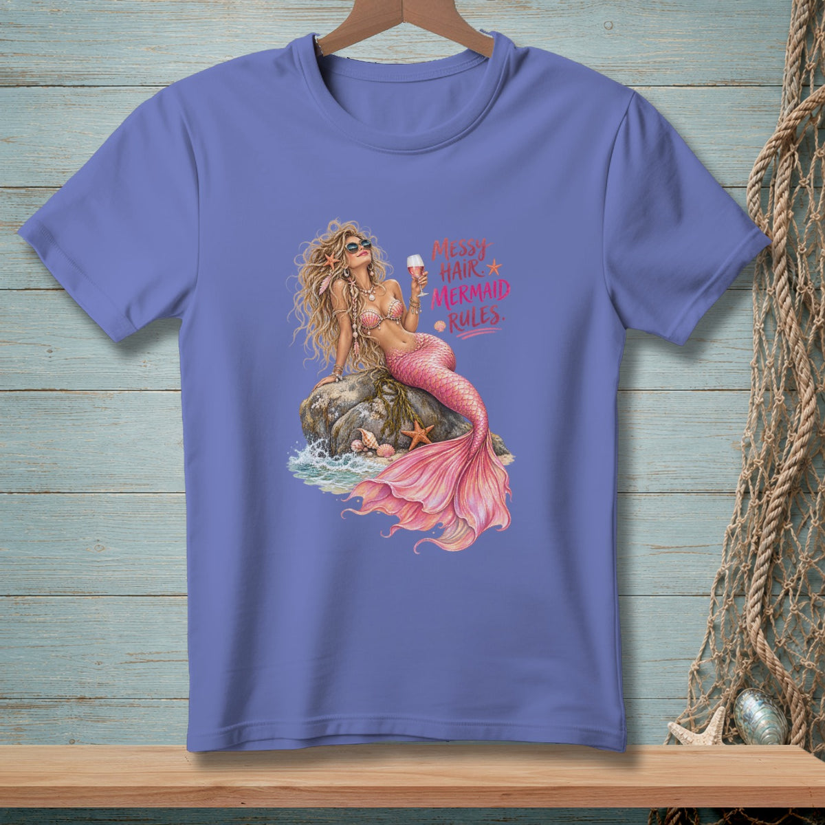 Purple t-shirt with a mermaid illustration and text "Messy Hair Mermaid Rules".