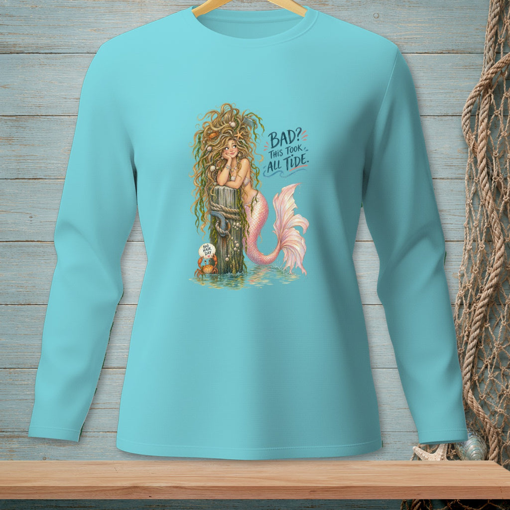 Turquoise long-sleeve shirt with a mermaid illustration and text "BAD? THIS TOOK ALL TIDE."