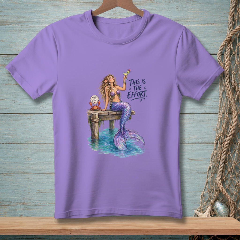 Purple t-shirt with a mermaid on a dock holding a drink and a crab.