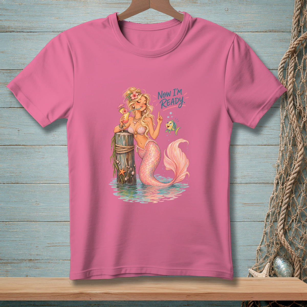 Pink t-shirt featuring a mermaid with a drink and the text "Now I'm Ready."