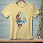 Mermaid with umbrella and dolphin splashing in water on light yellow t-shirt.