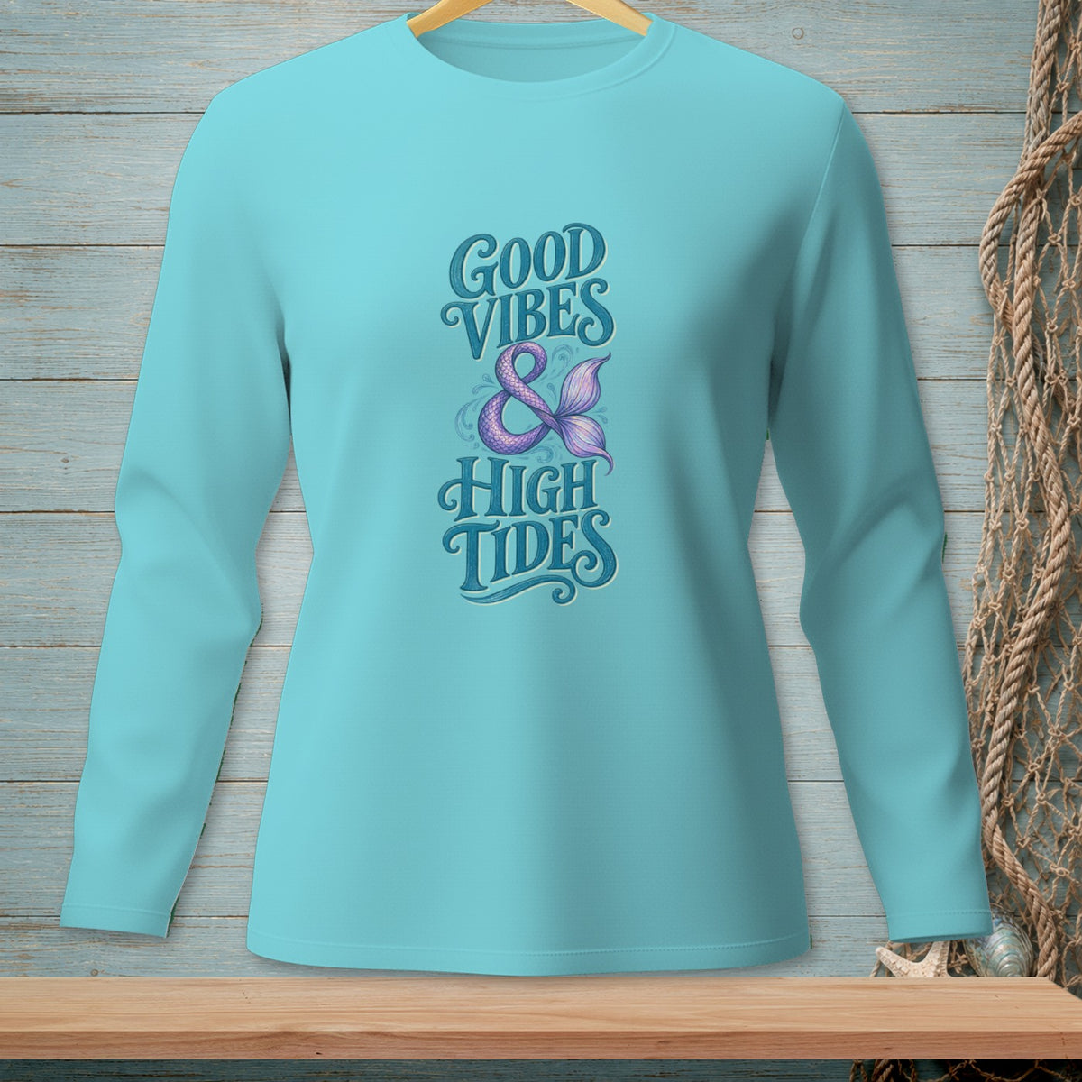 Aqua long-sleeve shirt with "Good Vibes & High Tides" mermaid tail design.
