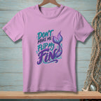 Lavender t-shirt with "Don't make me flip my fin" and mermaid tail graphic.