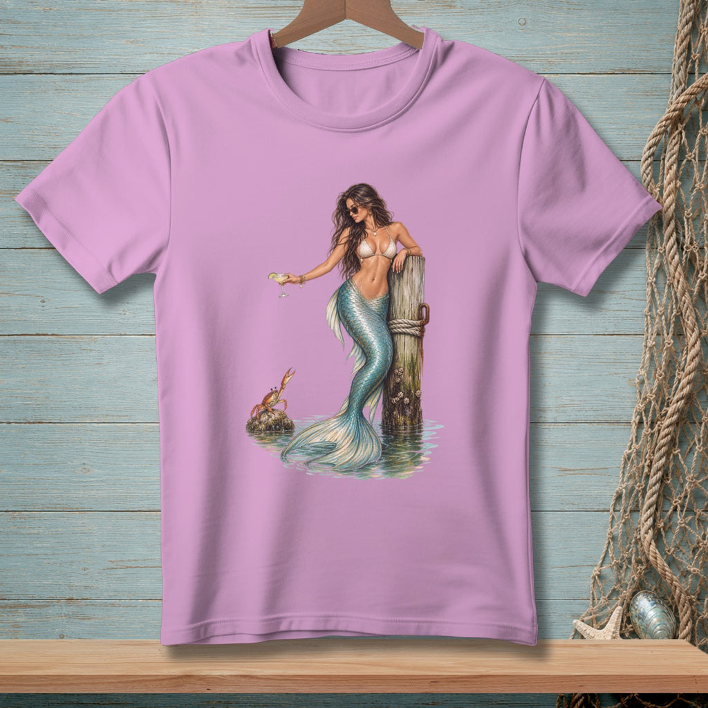 Pink t-shirt with a graphic of a mermaid holding a drink and a crab.