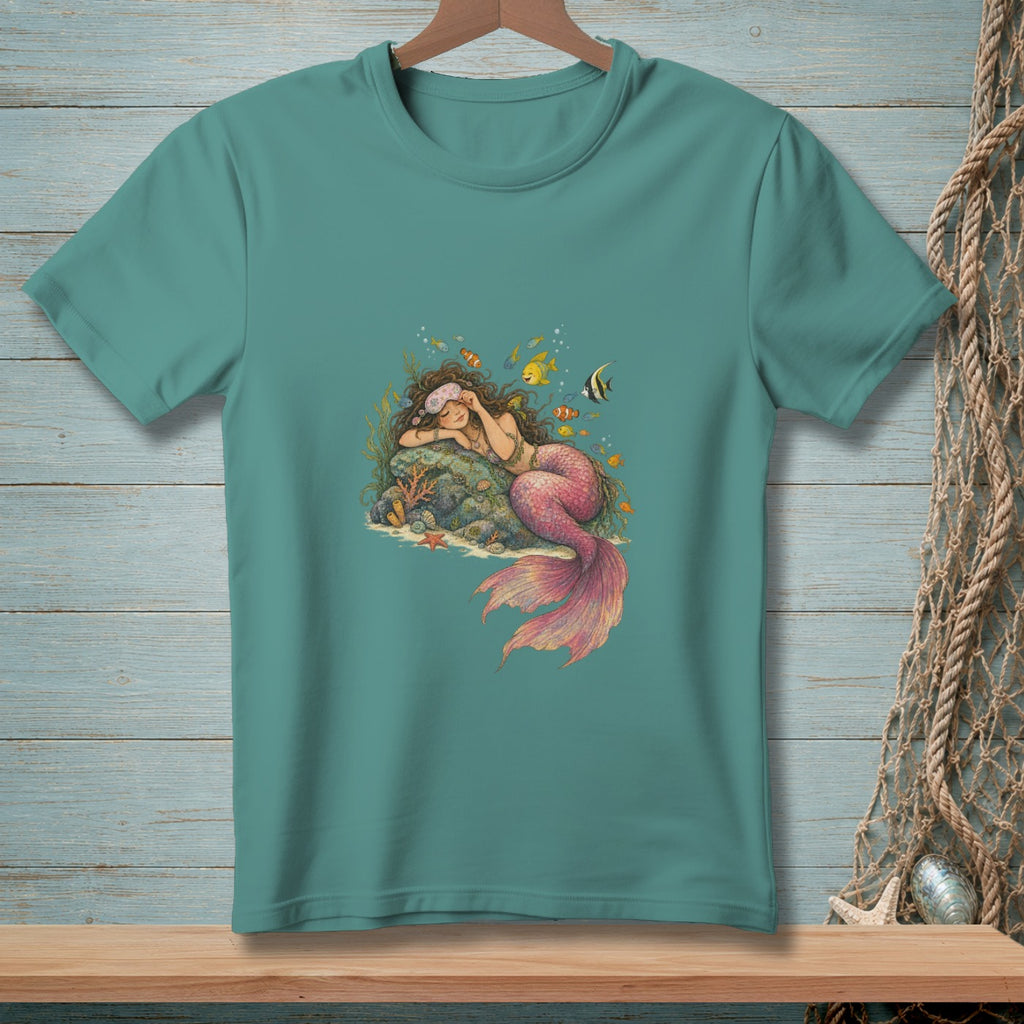 Teal t-shirt with illustration of a sleeping mermaid and colorful fish.