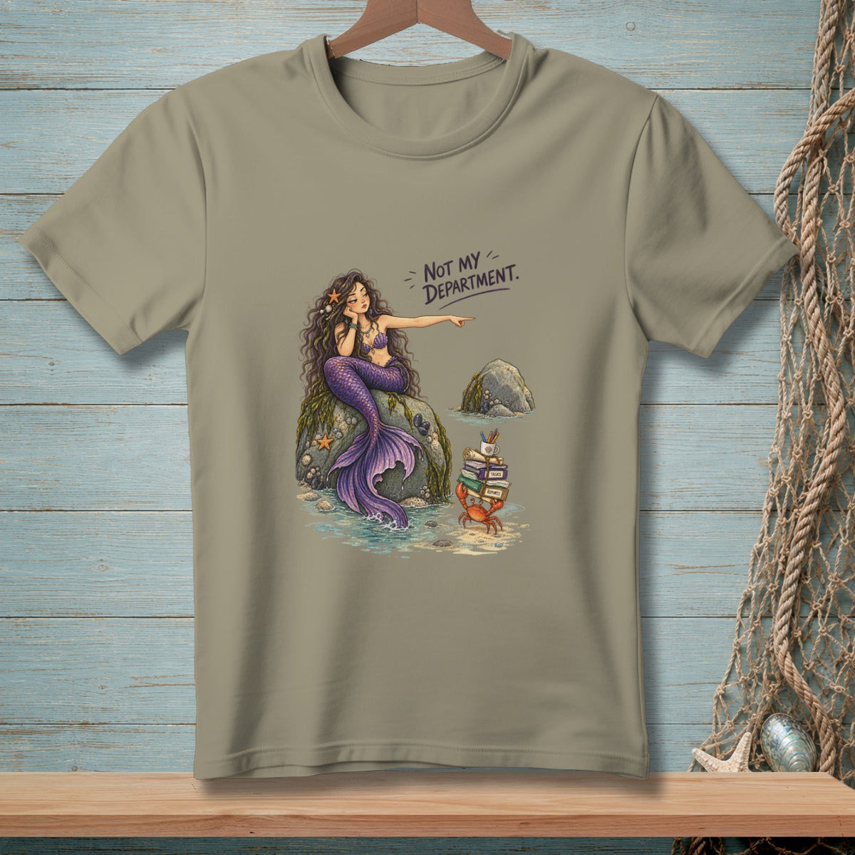 T-shirt graphic of mermaid pointing at crab with books, saying "Not My Department."