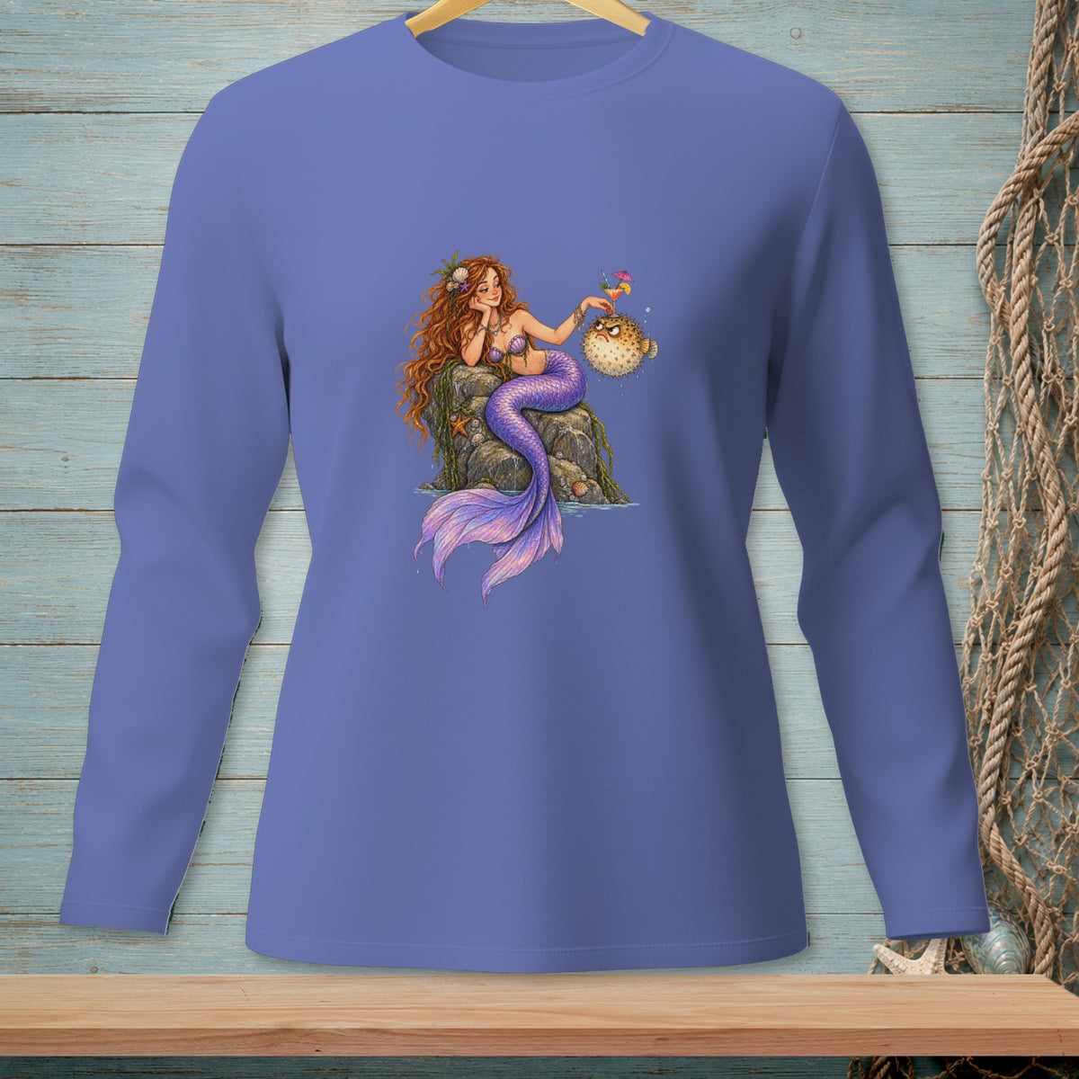 Illustration of a mermaid with a purple tail interacting with a pufferfish.