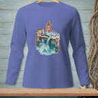 Mermaid sitting on a pier with a striped towel and lavender basket.