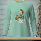 Mint green long-sleeve shirt with mermaid and lobster graphic on a rock.