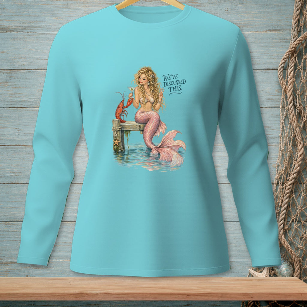 Mermaid with lobster on a pier reads "WE'VE DISCUSSED THIS."